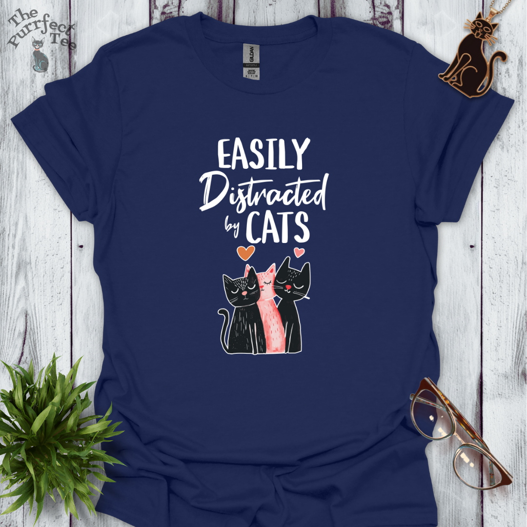 Easily distracted by cats - 3 cats
