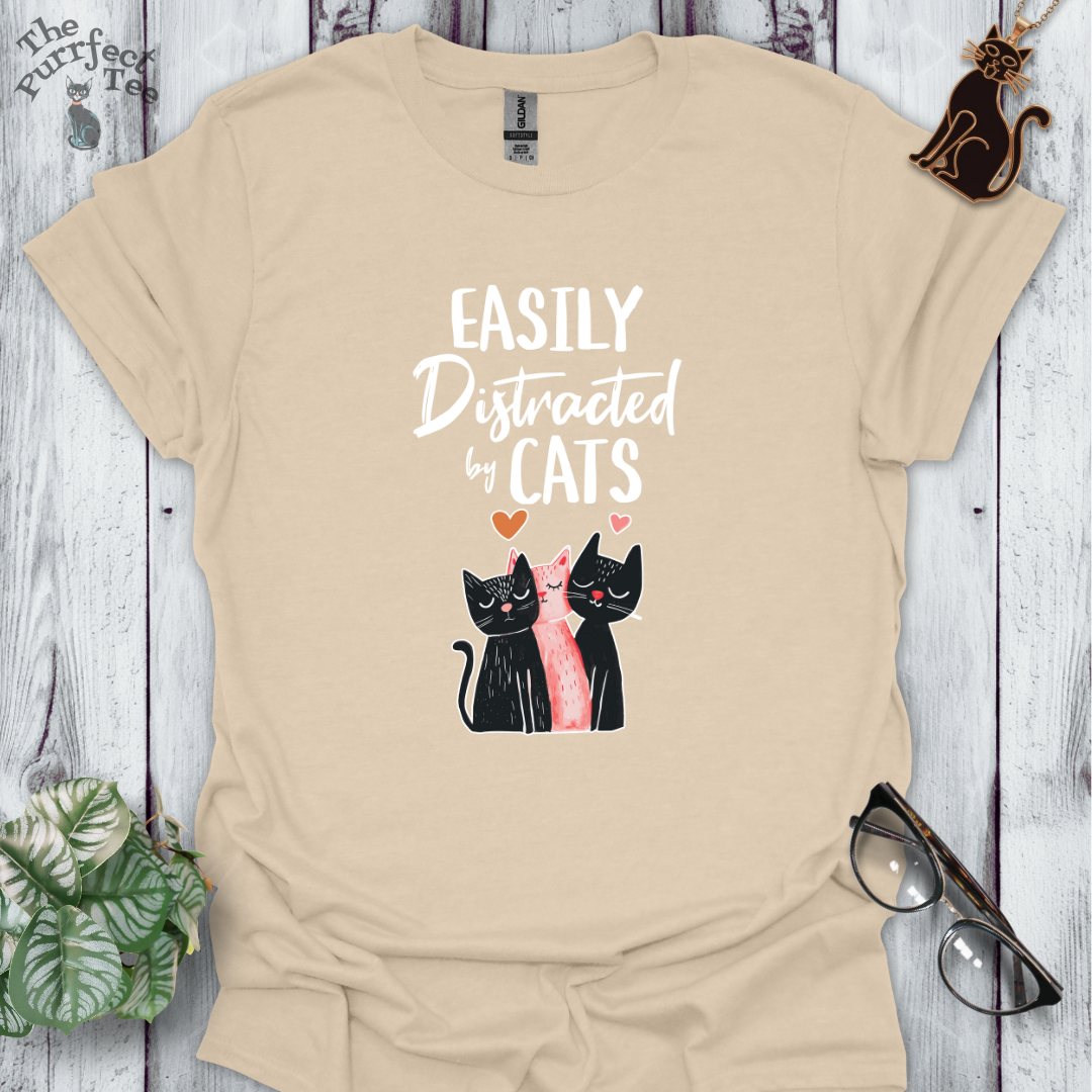 Easily distracted by cats - 3 cats