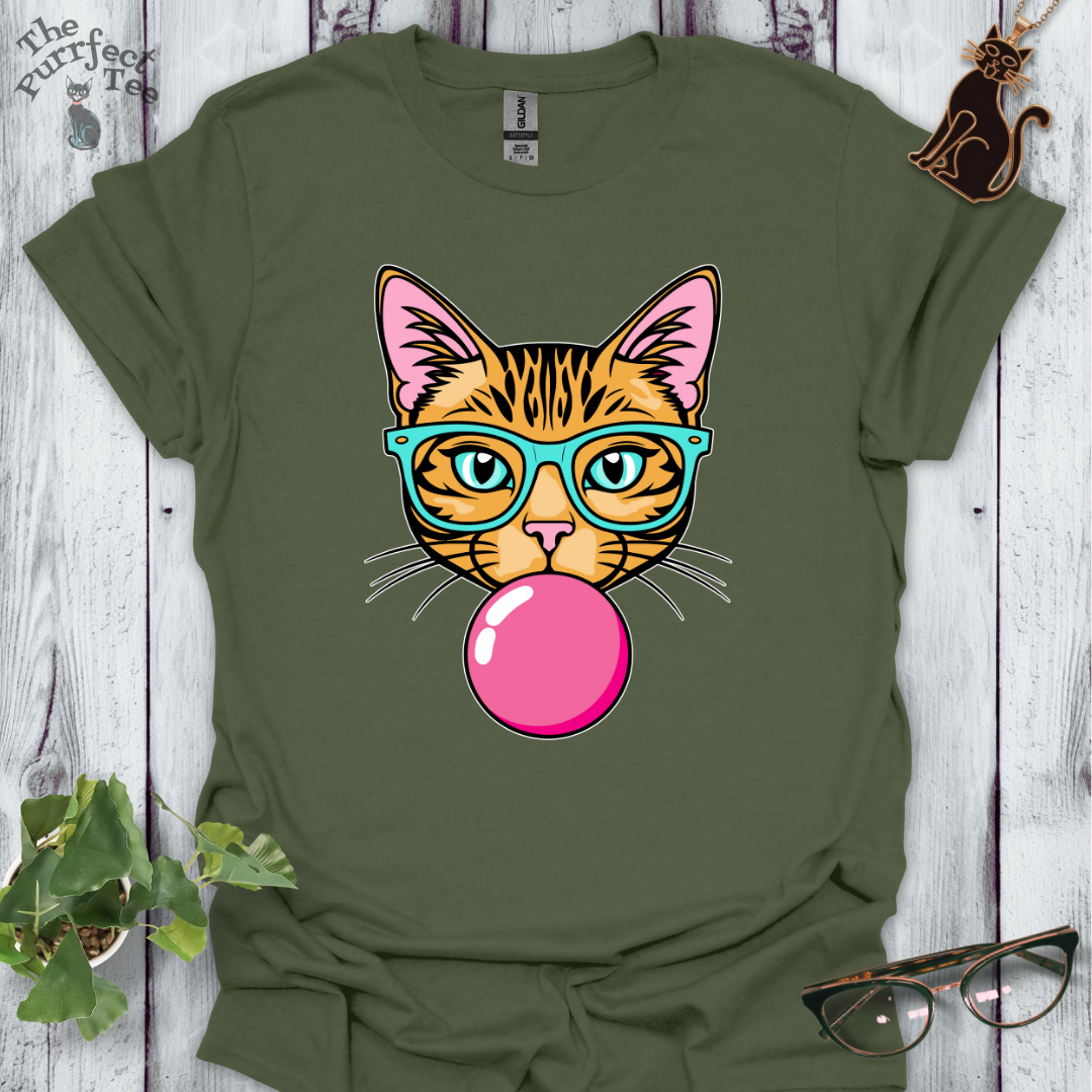 Ginger cat with turquoise glasses and bubble gum